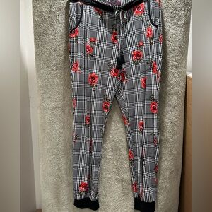 No Boundaries Black and White Houndstooth Joggers with Pink Logo